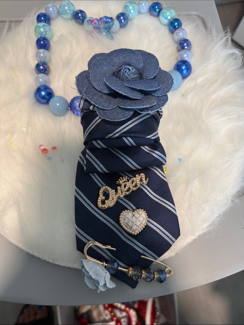 Navy Striped Necktie with Blue Floral Lapel Pin and Crystal Brooches